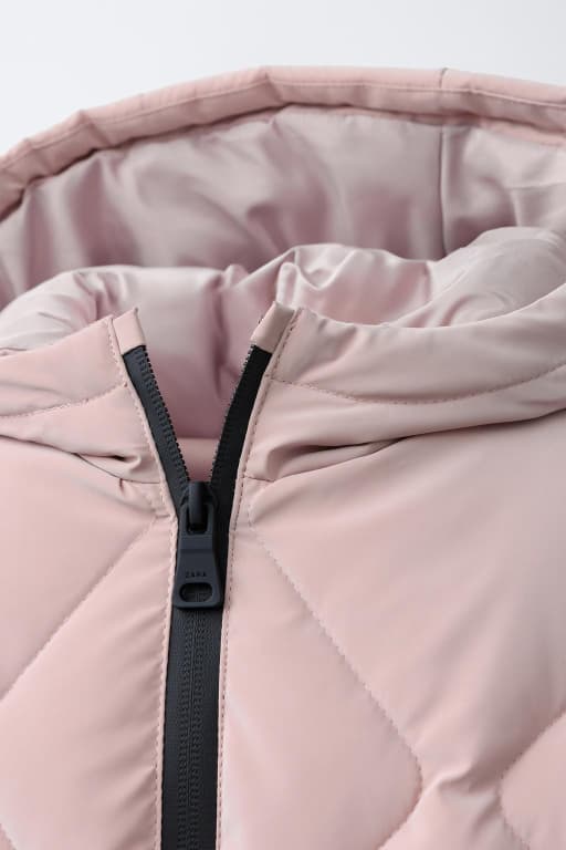 Long rubberized puffer coat