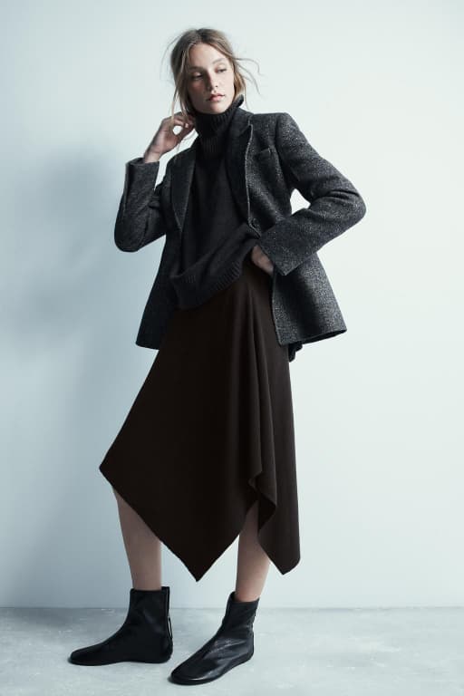 Asymmetric knit midi skirt